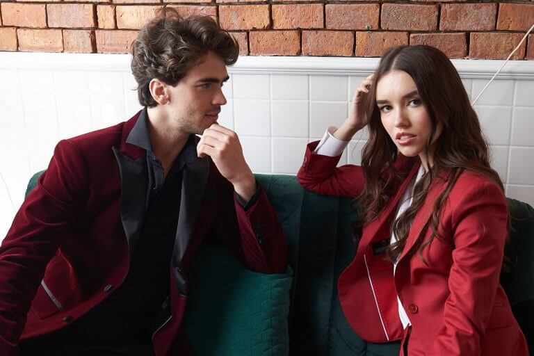 Man and woman in bespoke red suits
